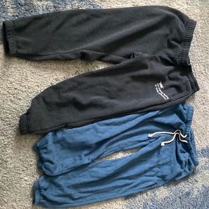 Two pair of women sweat 1 grey brand Love Streak and 1 light blue brand Arizona